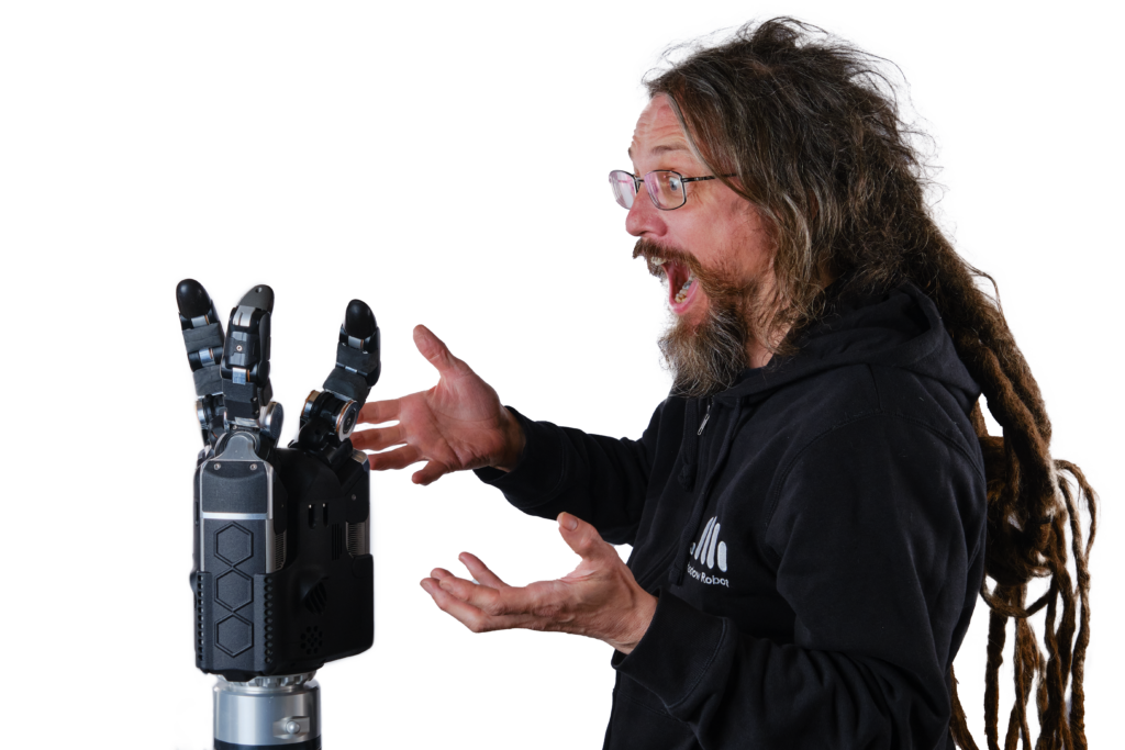 Our Blog 4 Rich Walker looking surprised and excited with the new Shadow Robot Hand